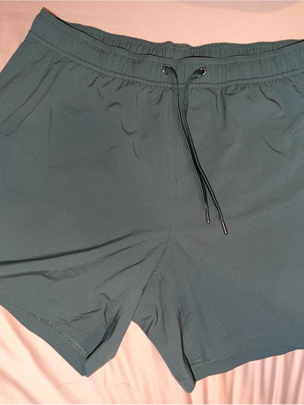 Vuori Men's Athletic Shorts in Teal Green